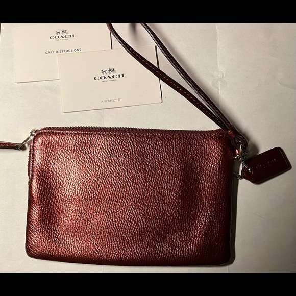 Red metallic Coach wristlet with zipper closure + bag tag attached - Picture 2 of 9
